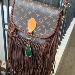 Louis Vuitton purse, repurposed. The gem keychain is removable! Barely used.